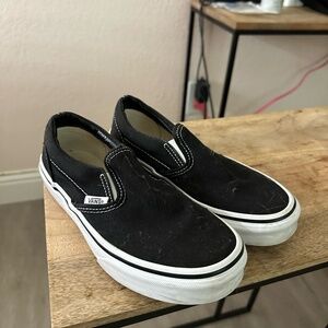 Black slip-on Vans